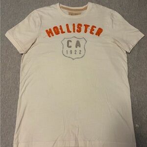 Hollister Men's Cream Tee with Orange Accents